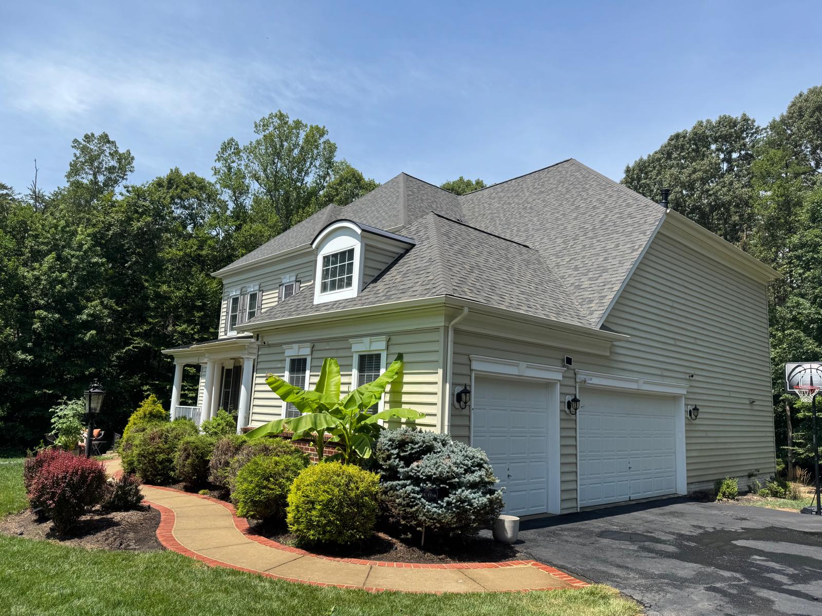 Clean two-story home with landscaped front yard