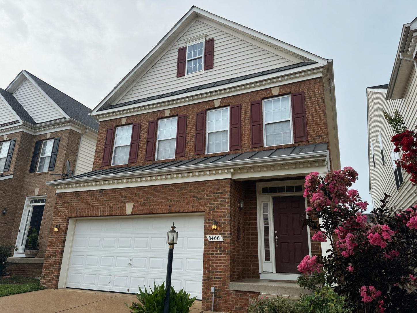 Clean brick home with covered porch